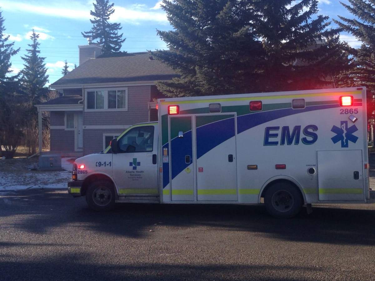 Police at the scene of a home where two people were found dead Saturday morning. 
