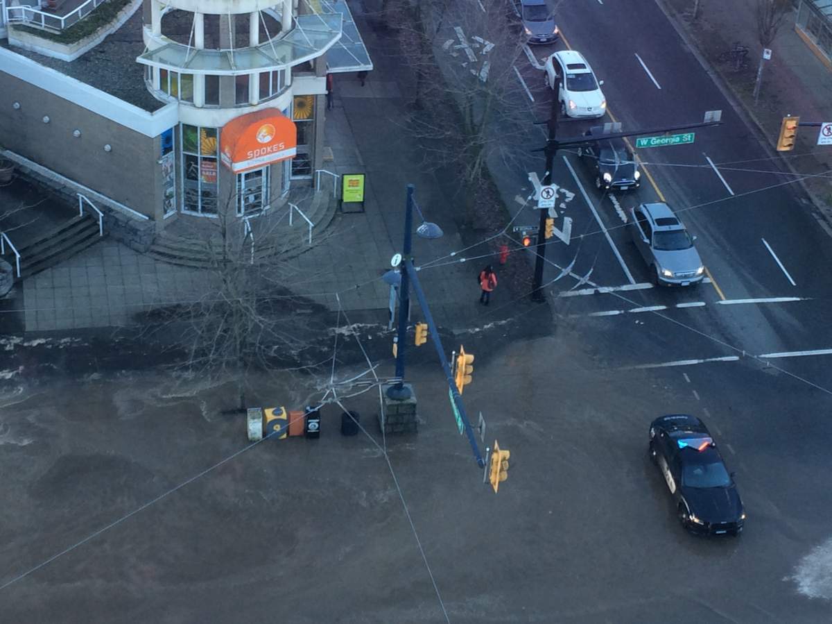 A water main burst on Robson Street causing flooding at Georgia and Denman on Sunday morning.