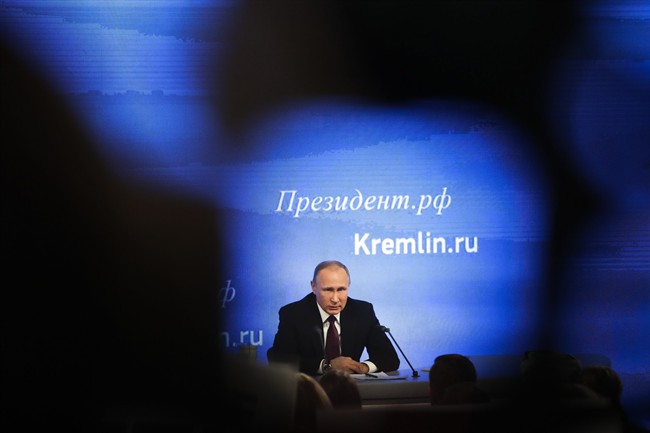 Russian President Vladimir Putin speaks during his annual news conference in Moscow, Russia, Friday, Dec. 23, 2016.
