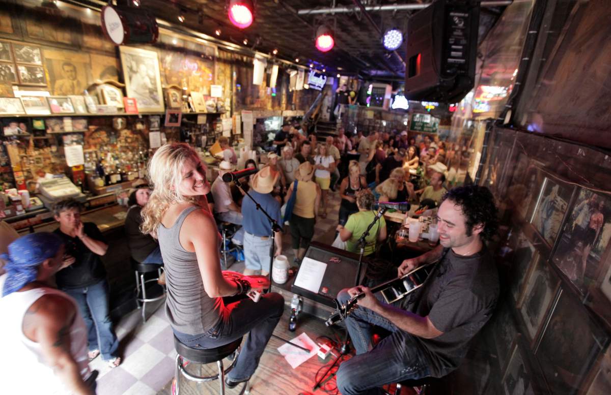 FILE -This June 9, 2010 photo shows Nichole Rapisardi and West Butler performing at Tootsies Orchid Lounge in Nashville, Tenn. 