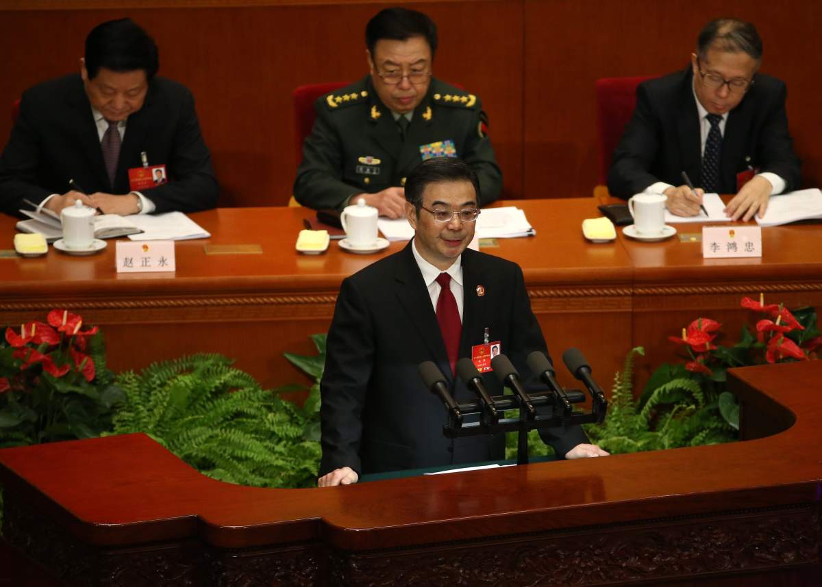 Zhou Qiang, President and Chief Justice of the Supreme People's Court of China delivers a report during the third plenary meeting of the fourth session of China's 12th National People's Congress (NPC) at the Great Hall of the People in Beijing, China on March 13, 2016. 
