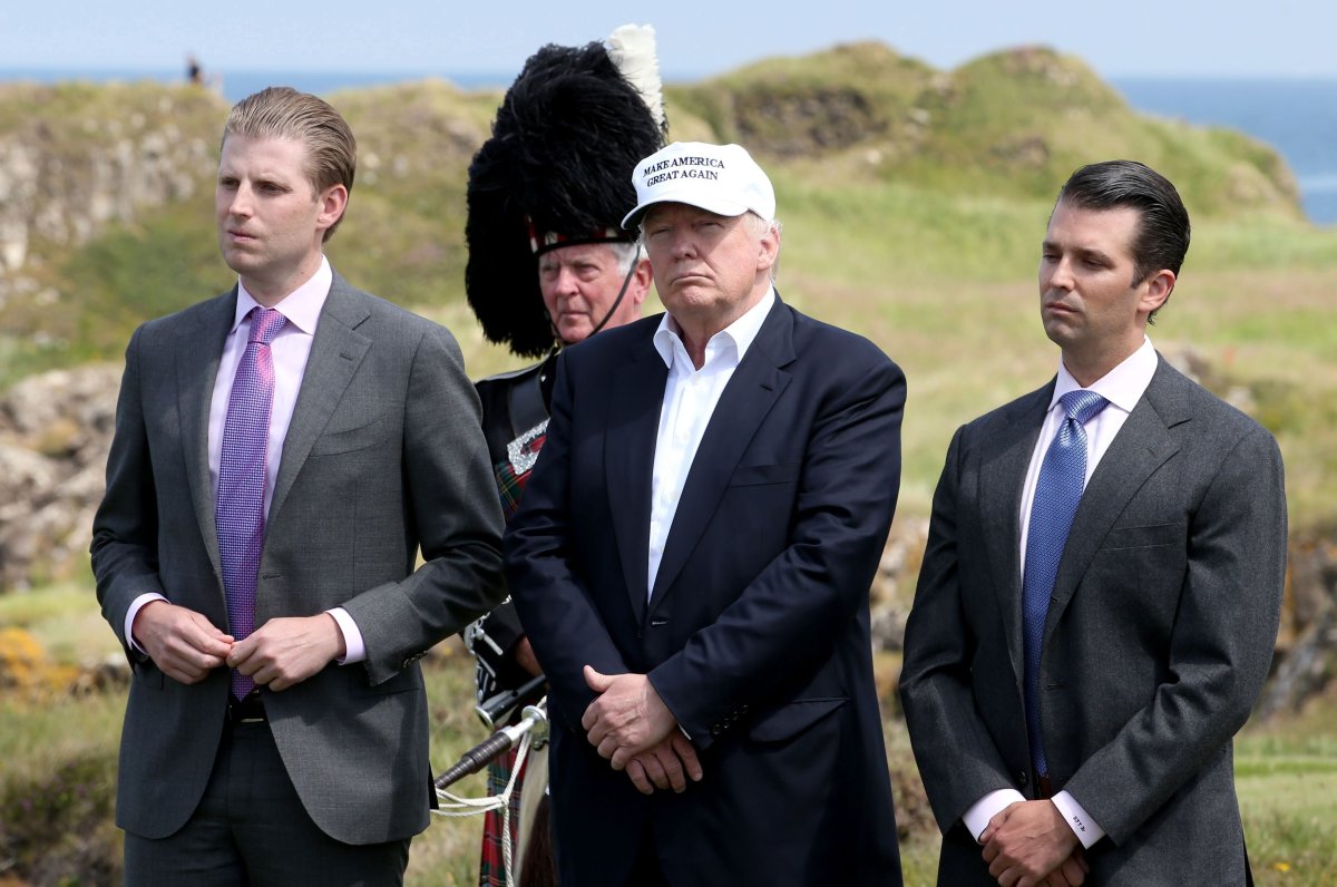 U.S. President-elect hopeful Donald Trump, with his sons Eric (left) and Donald Trump Jr at his revamped Trump Turnberry golf course in South Ayrshire.