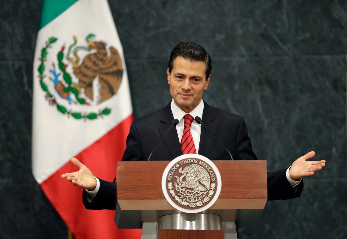 Mexico's President Enrique Pena Nieto gives an address in response to the U.S. presidential election in Mexico City, Wednesday, Nov. 9, 2016. The Mexican president said in a brief televised address that he has spoken with U.S. President-elect Donald Trump to congratulate him and his family. He said they agreed to meet during the transition period to discuss the U.S.-Mexico relationship. 