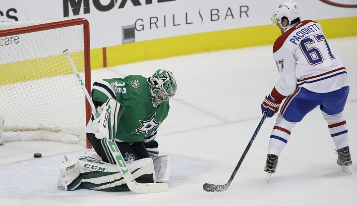 Montreal Canadiens left wing Max Pacioretty (67) scores the game winning goal against Dallas Stars goalie Kari Lehtonen (32) during overtime in an NHL hockey game in Dallas, Wednesday, Jan. 4, 2017.