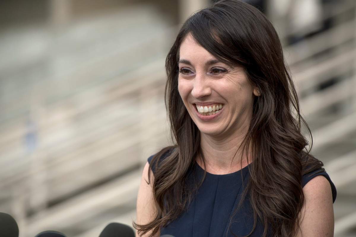 Michelle Susan Hadley addresses the media after being cleared of all charges in a plot to frame her, after coming out of court in Fullerton, Calif., Monday, Jan. 9, 2017. Hadley has been exonerated of charges that she responded to "rape fantasy" ads on Craigslist in order to get men to attack her ex-boyfriend's new wife. Prosecutors now say that it was the alleged victim in the case who was trying to frame her husband's ex by placing the malicious ads.