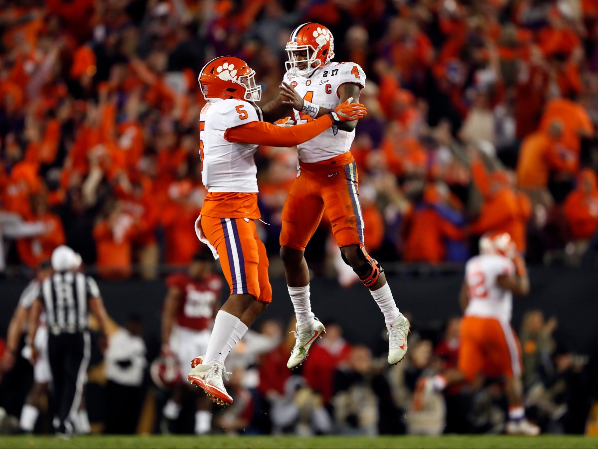 Clemson's Deshaun Watson and Shaq Smith (5) celebrate a last second touchdown during the second half of the NCAA college football playoff championship game against Alabama Tuesday, Jan. 10, 2017, in Tampa, Fla. 