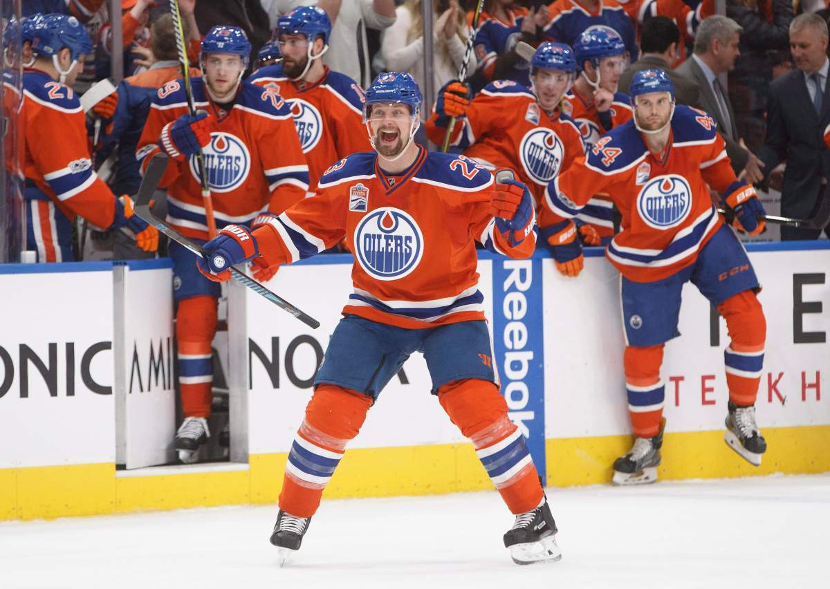Edmonton Oilers' Matt Hendricks (23) and teammates celebrate the shootout win over the Calgary Flames during NHL action in Edmonton, Alta., on Saturday January 14, 2017. 