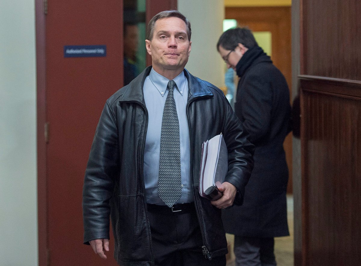 Quintin Sponagle heads from a sentencing hearing at provincial court in Halifax on Thursday, Jan. 19, 2017. Sponagle entered a guilty plea to one count of fraud over $5,000 last December related to a Ponzi scheme that scammed Nova Scotia churchgoers and others out of millions of dollars.