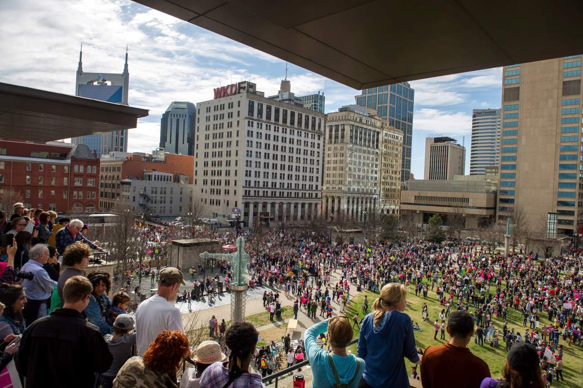 Demonstrators gather in Public Square during a march in solidarity with the Women’s March on Washington, Saturday, Jan. 21, 2017, in Nashville, Tenn.