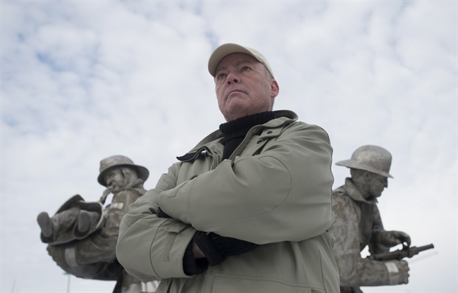 Former firefighter Norman Traversy poses for a photo at a firefighters memorial Tuesday, January 17, 2017 in Ottawa. Traversy, a former Mississauga firefighter with PTSD, is supporting a private member's bill that would create a national framework to track the disorder.