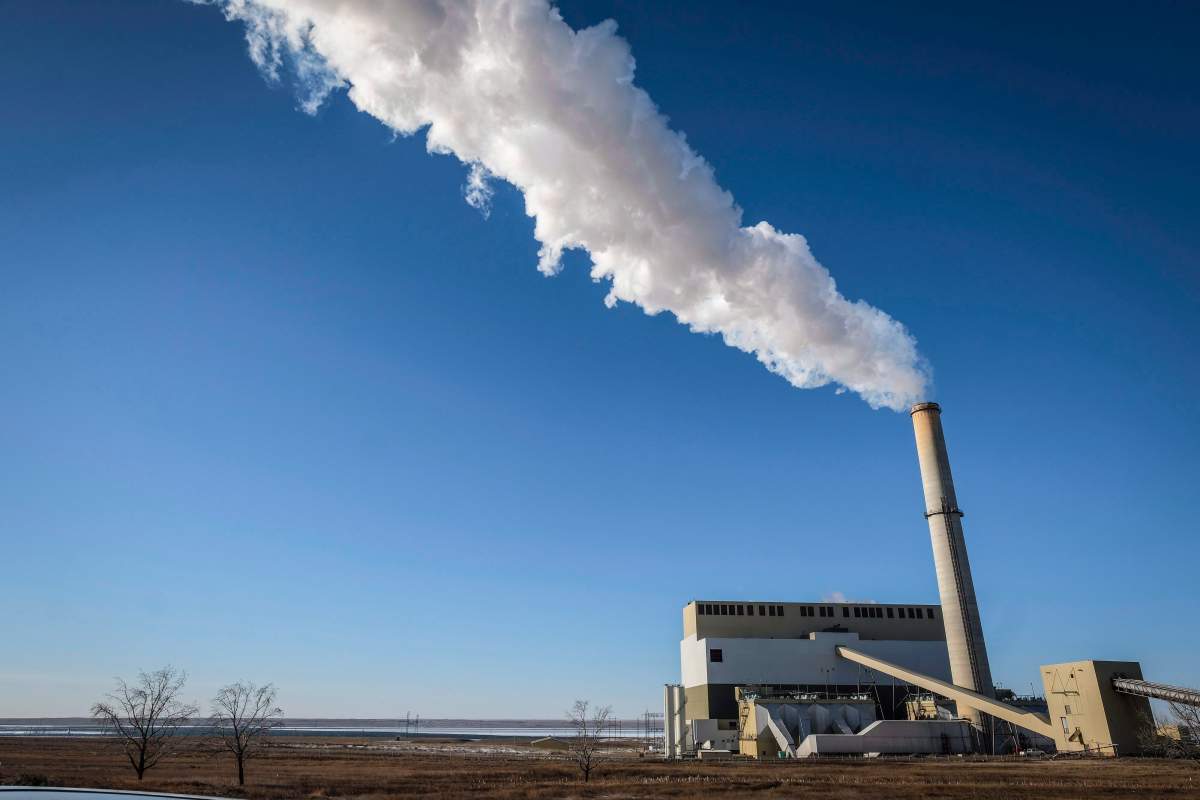 Steam billows from the Sheerness coal fired generating station near Hanna, Alta., Tuesday, Dec. 13, 2016.