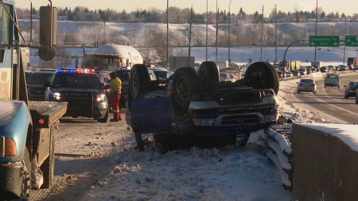 Emergency crews respond to a rollover on westbound Glenmore Trail approaching Blackfoot Trail S.E. on Monday, Jan. 2, 2017.