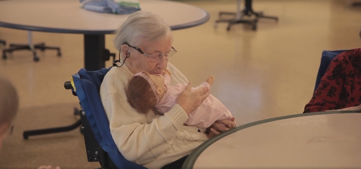 A senior holds a doll as part of a "Doll Therapy" program at Saanich Peninsula Hospital.