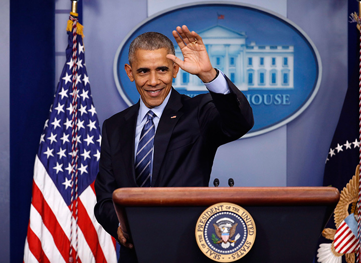 President Barack Obama waves at the conclusion of his news conference in the briefing room of the White House in Washington, Friday, Dec. 16, 2016. 