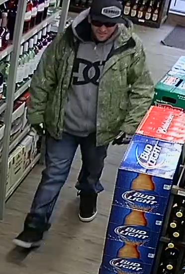 Photo of a man suspected of using bear spray on a Bower Liquor store employee.