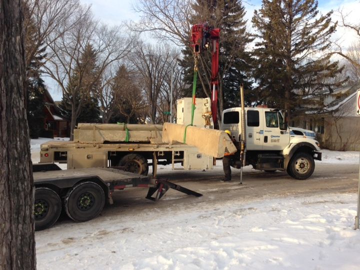 City of Edmonton crews remove concrete barriers from Belgravia neighbourhood Saturday, Jan. 28, 2017.