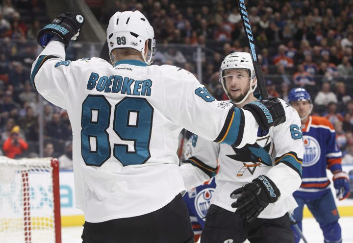 San Jose Sharks' Mikkel Boedker (89) and Melker Karlsson (68) celebrate a goal against the Edmonton Oilers during first period NHL action in Edmonton, Alta., on Tuesday January 10, 2017. 