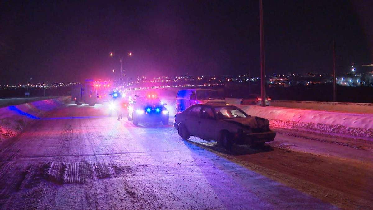 Police respond to a two-vehicle collision on northbound Deerfoot Trail at the Calf Robe Bridge on Monday, Jan. 9, 2017.