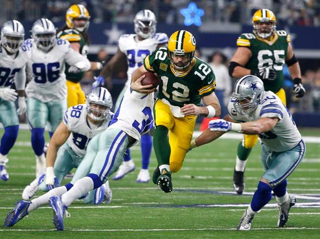 Green Bay Packers QB Aaron Rodgers (12) has signed the most lucrative contract in NFL history.