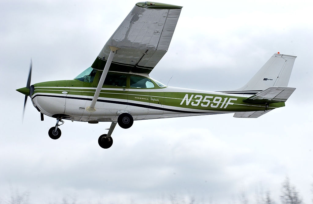 The downed plane is a Cessna 172 similar to the one shown in this picture.