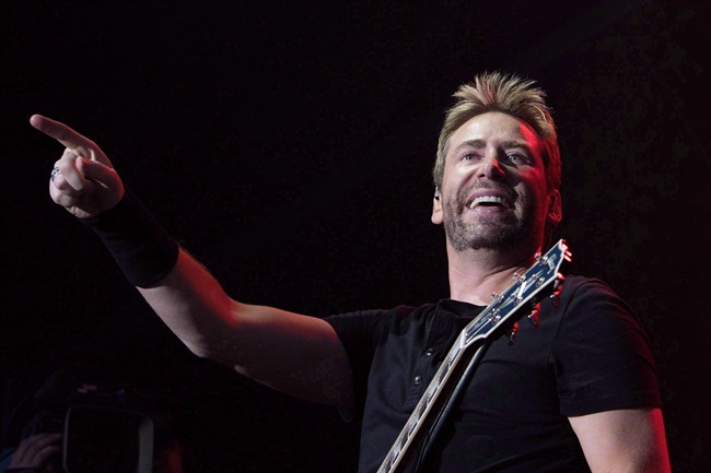 Nickelback frontman Chad Kroeger performs during Fire Aid for Fort McMurray in Edmonton on Wednesday June 29, 2016. Nickelback is planning a new album after signing a global record deal.