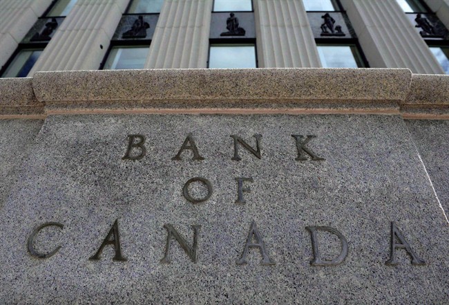 The Bank of Canada building is pictured in Ottawa on September 6, 2011. A greater number of Canadian firms expect to benefit from what they anticipate will be stronger post-election growth in the United States, a new Bank of Canada poll suggested Monday. THE CANADIAN PRESS/Sean Kilpatrick.