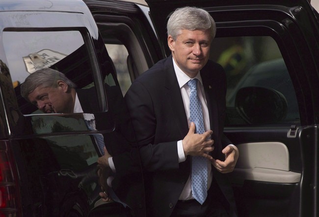 Outgoing Prime Minister Stephen Harper arrives at his Langevin office in Ottawa, Wednesday Oct. 21, 2015. The former prime minister says Donald Trump's presidency is a major source of international uncertainty that will "reverse" seven decades of U.S. foreign policy.