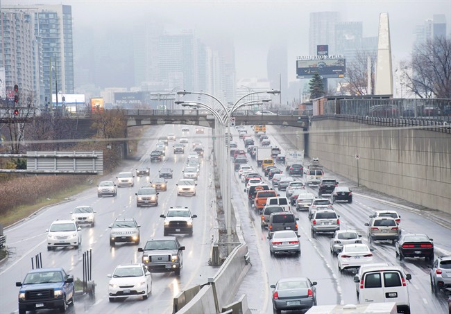 Vehicles make their way into and out of downtown Toronto along the Gardiner Expressway. THE CANADIAN PRESS/Nathan Denette.