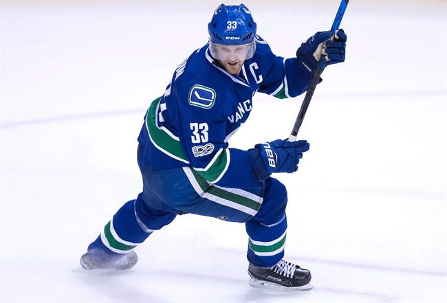 File photo. The Vancouver Canucks lost 5-2 to the Calgary Flames Saturday.