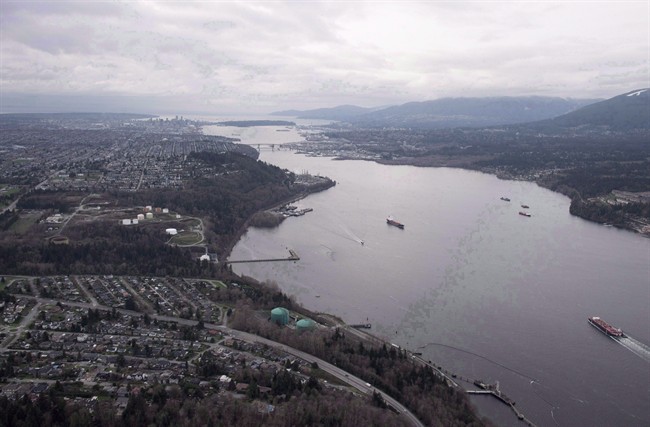 Kinder Morgan Trans Mountain Expansion Project's Westeridge loading dock, at bottom with green tanks, is seen in Burnaby, B.C., on Friday, Nov. 25, 2016. British Columbia has granted environmental approval to the expansion of the Trans Mountain pipeline.The decision checks off another of the five conditions that Premier Christy Clark placed on the pipeline's approval.