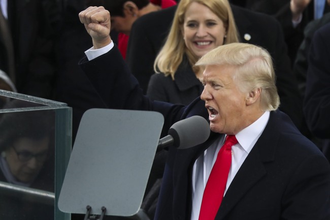 President Donald Trump pumps his first at the end of his speech after bring sworn in as the 45th president of the United States during the 58th Presidential Inauguration at the U.S. Capitol in Washington, Friday, Jan. 20, 2017.