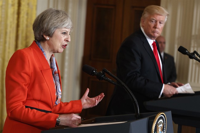 British Prime Minister Theresa May speaks during a news conference with President Donald Trump in the East Room of the White House in Washington, Friday, Jan. 27, 2017.