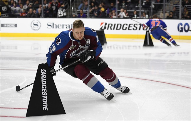 Colorado Avalanche's Nathan MacKinnon, left, skates against Edmonton Oilers' Connor McDavid during the Fastest Skater portion of the NHL All-Star Skills Competition on Saturday, Jan. 28, 2017, in Los Angeles.