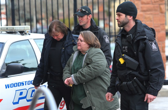 Elizabeth Wettlaufer is escorted into the courthouse in Woodstock, Ontario on Friday, Jan. 13, 2017.