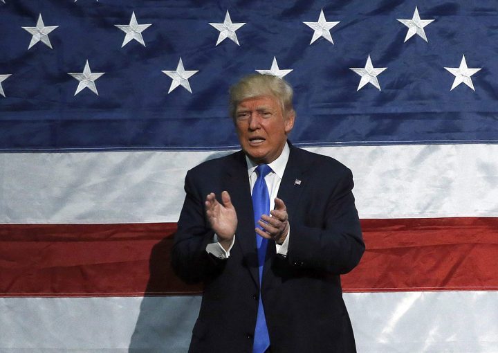 Supporters of candidate Donald Trump applauds at a campaign rally in Sioux City, Iowa, Sunday, Nov. 6, 2016. (AP Photo/Brennan Linsley).