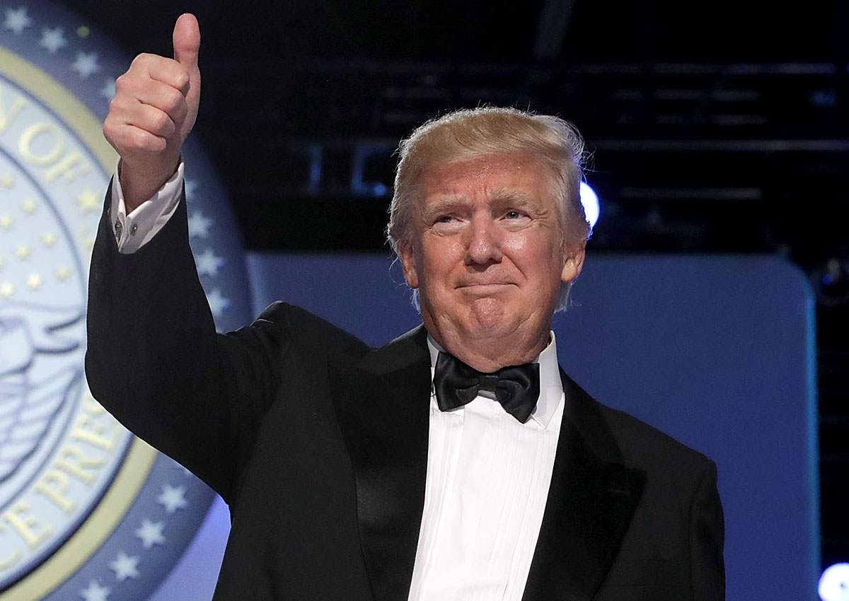 WASHINGTON, DC - JANUARY 20:  U.S. President Donald Trump and first lady Melania Trump thank guests during the inaugural Freedom Ball at the Washington Convention Center January 20, 2017 in Washington, DC. The ball is part of the celebrations following the inauguration of Pence and U.S. President Donald J. Trump.  (Photo by Chip Somodevilla/Getty Images).