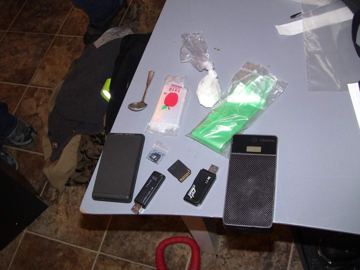 Calgary police said drugs, cash and weapons were found during a search of two homes, two vehicles and a storage locker on Jan. 24, 2017.