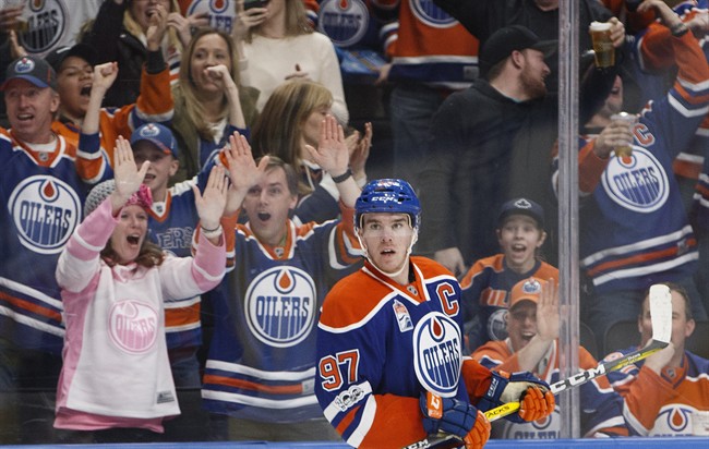 Edmonton Oilers' Connor McDavid (97) reacts to his overtime goal against the Florida Panthers in NHL action in Edmonton, Alta., on Wednesday January 18, 2017.