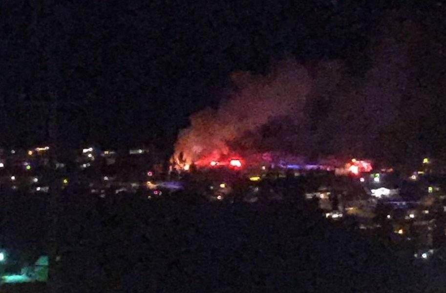 Kelowna residents called 911 after flames were spotted on the roof of a Black Mountain home Monday evening. Everyone escaped the burning house.