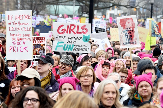 Protesters march, in support of the Women's March on Washington, in Toronto on Saturday, January 21, 2017.