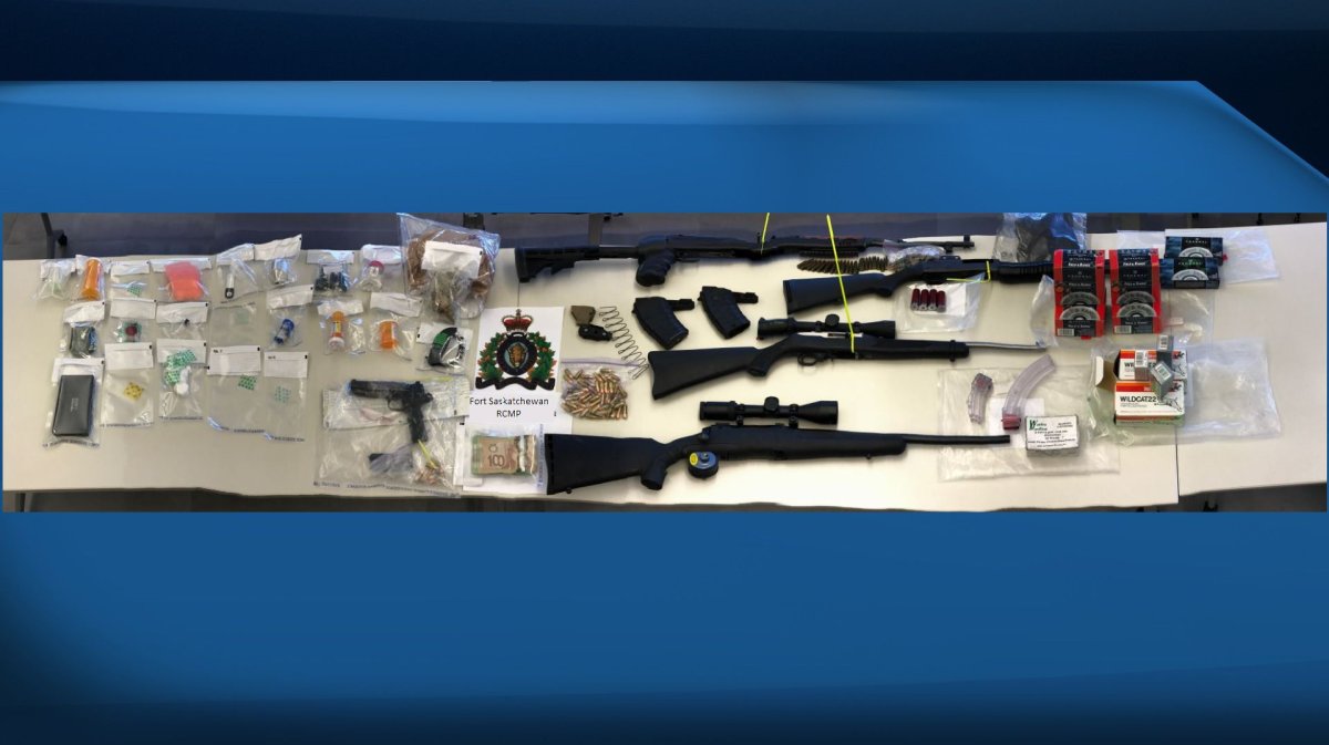 Fort Saskatchewan RCMP photo of stolen property, guns, firearms accessories and drugs. January 13, 2017.