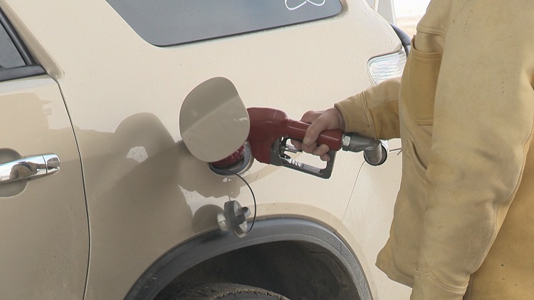 A driver in Lethbridge, Alta. fills their vehicle up with gasoline.