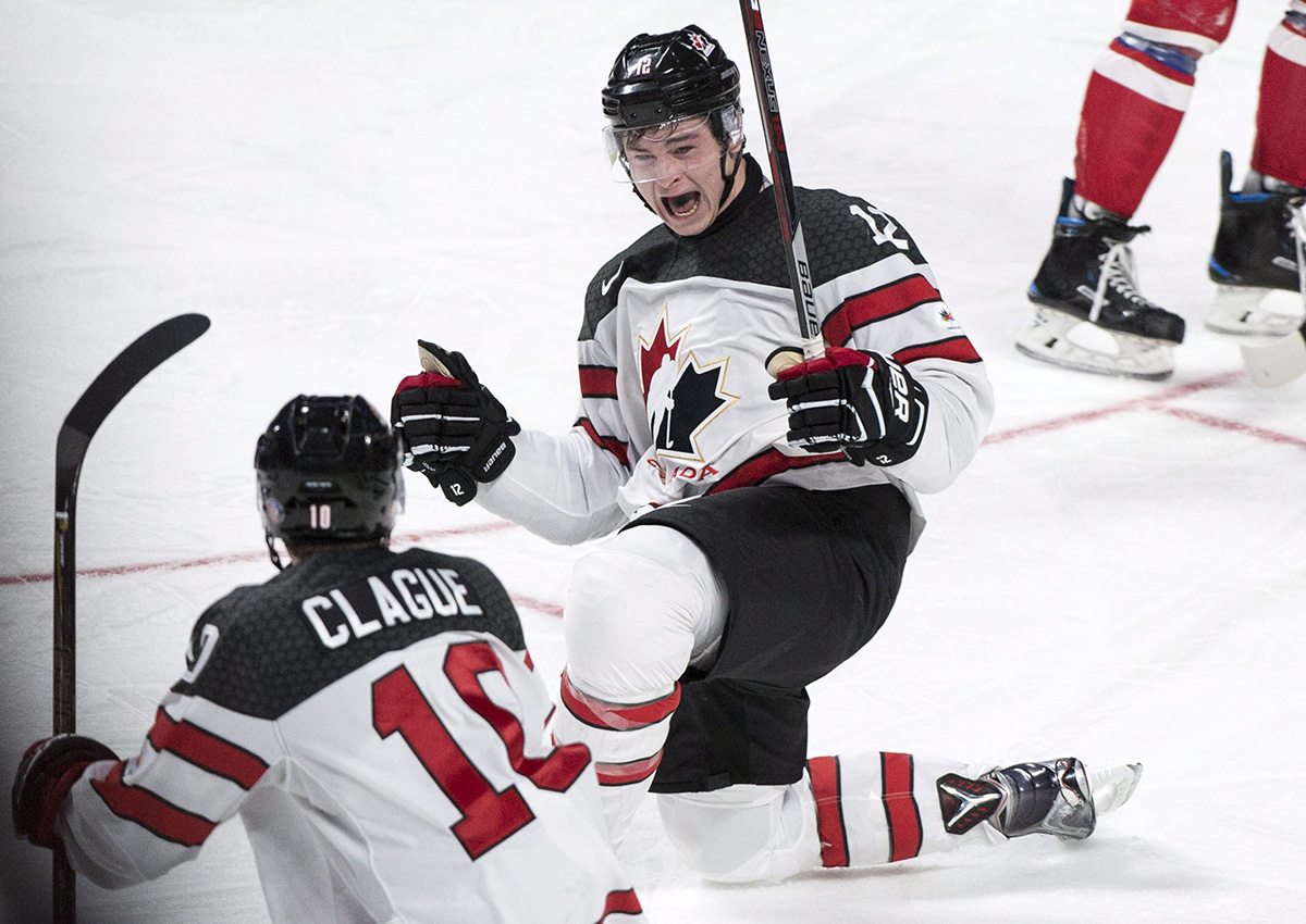 Canada forward Julien Gauthier (12) celebrates his goal against the Czech Republic with teammate Kale Clague during third period quarter-final IIHF World Junior Championship hockey action Monday, January 2, 2017 in Montreal. 