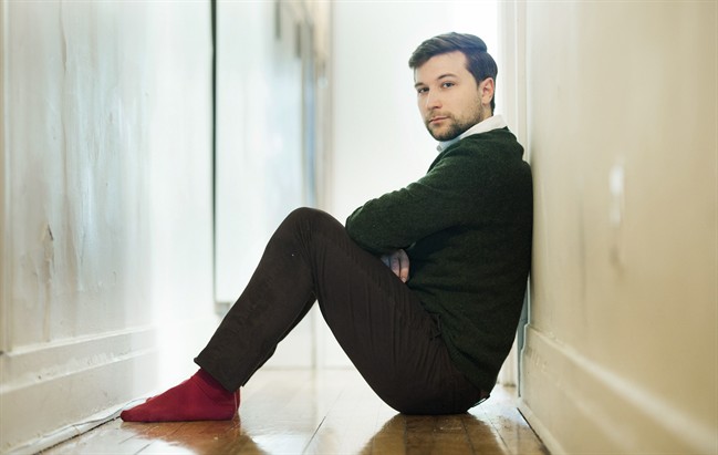 Gabriel Nadeau-Dubois poses for a photograph at his home in Montreal, Thursday, January 5, 2017. A common refrain right now in Quebec politics is how the province is full of so-called political orphans. How many Quebecers feel this way is open to debate, but a prominent 26-year-old sovereigntist has been criss-crossing the province listening to their complaints and, not so quietly, preparing a new plan for Quebec.