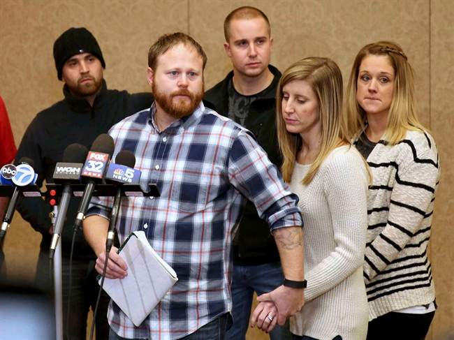 Family spokesman David Boyd and others hold a news conference Thursday, Jan. 5, 2017, in Crystal Lake, Ill., after an 18-year-old man was assaulted in Chicago earlier this week. Four people were charged with hate crimes in connection with a video broadcast live on Facebook that showed a mentally disabled white man being beaten and taunted, threatened with a knife and forced to drink from a toilet. Boyd is the brother-in-law of the victim.