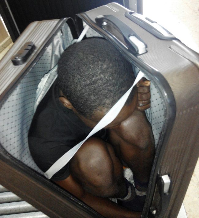 Woman arrested for trying to smuggle migrant into Spain in suitcase - image