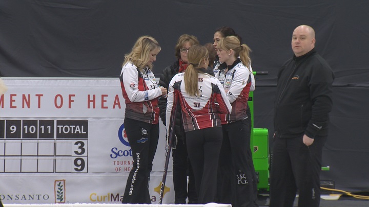 Jennifer Jones (left) meets with her team following their opening draw win at the 2017 Manitoba Scotties Tournament of Hearts.