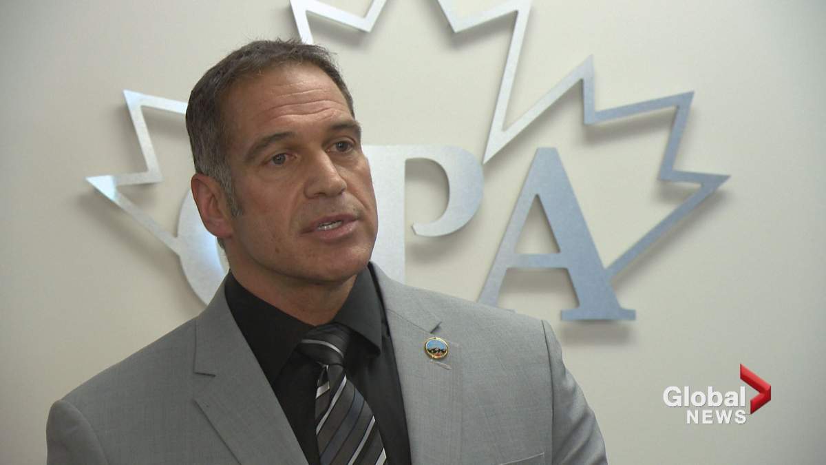 An assault charge against Calgary Police Association president Les Kaminski was dropped July 17; he is awaiting trial on a perjury charge.