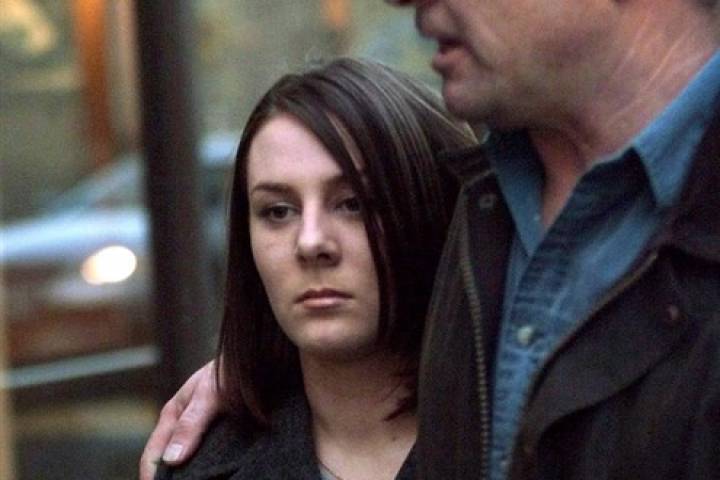 Kelly Ellard and her father Lawrence leave the Vancouver courthouse, March 30, 2000. 