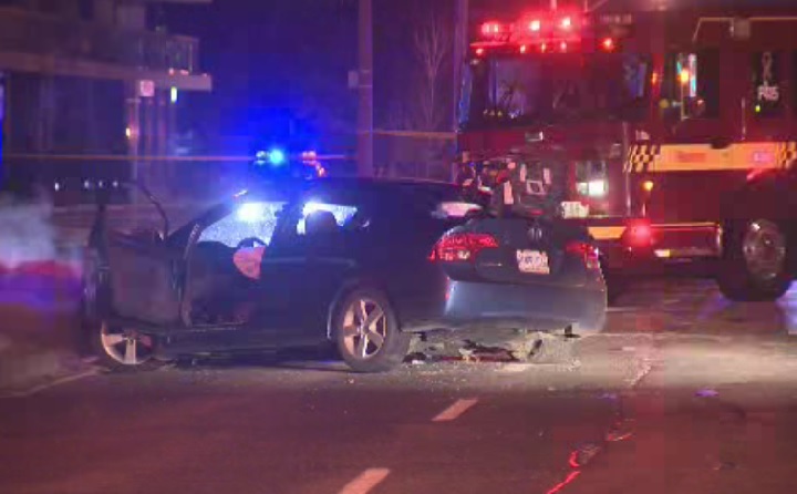 Police investigate a single-vehicle crash in Toronto on Jan. 15, 2017.